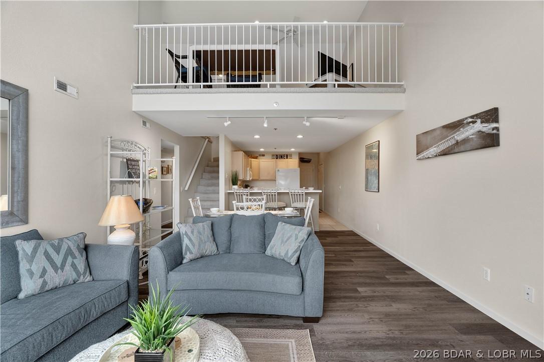 Image 4: Living space in loft over looks lpwer living