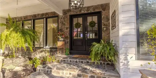 Image 3: The new front doors and stonework set the tone fro