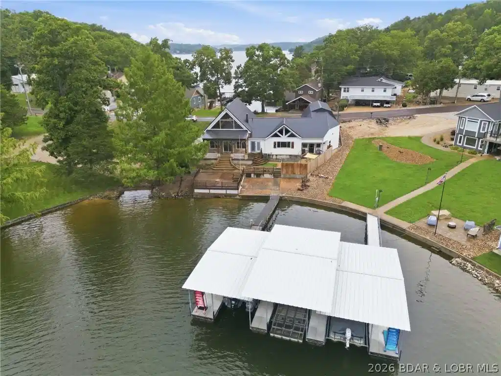 Image 1: Lakefront of home.  Notice the view of the lake on