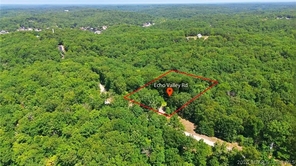 Image 1: Aerial view highlighting the property boundary lin