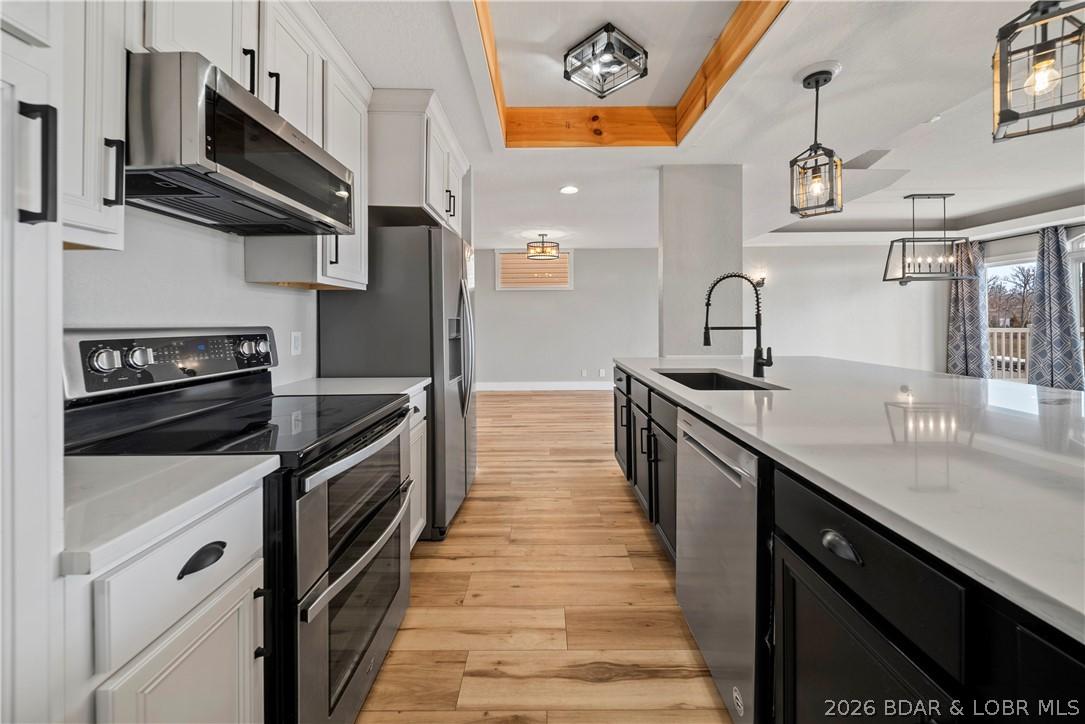 Image 1: Updated Throughout w/ Modern Finishes