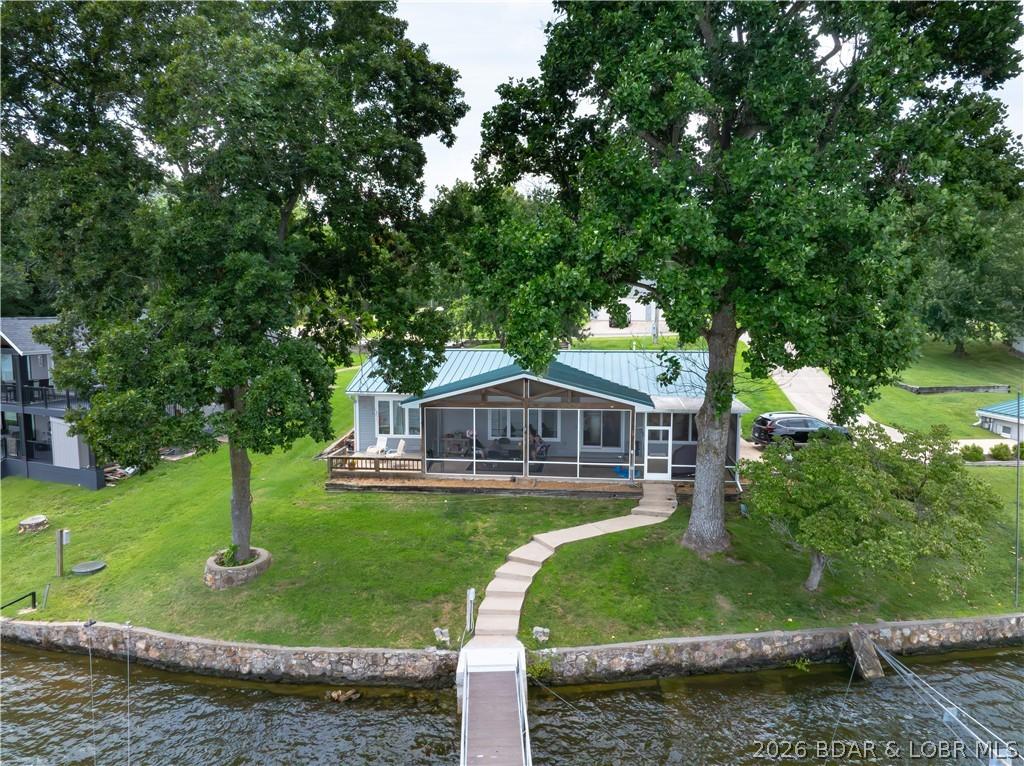 Image 3: Lake View of Main Home-Nestled Between Two Trees f
