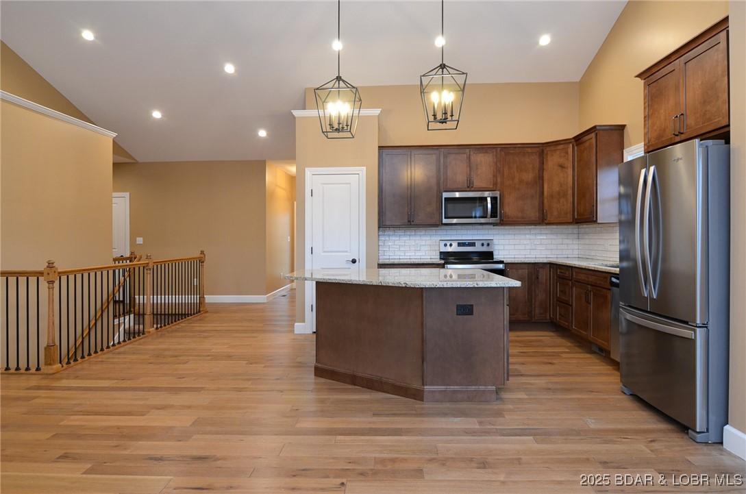 Image 4: Facsimile of prior model kitchen to lower level