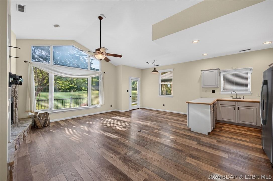 Image 3: Totally updated with luxury plank flooring through