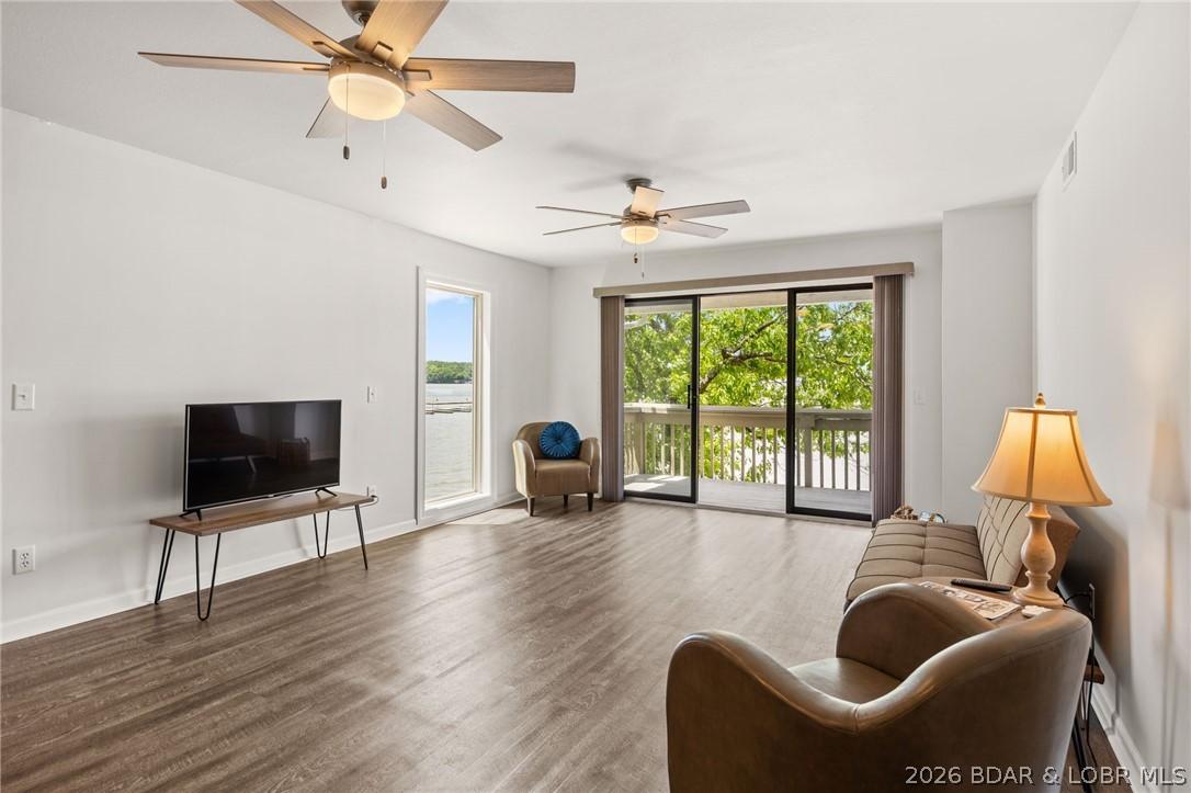 Image 2: Living room with vinyl plank floors