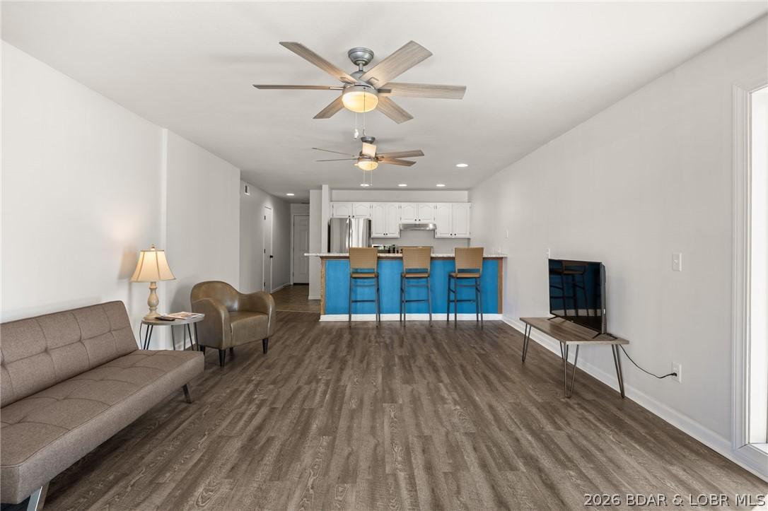 Image 3: View of living room and kitchen from the lakeside
