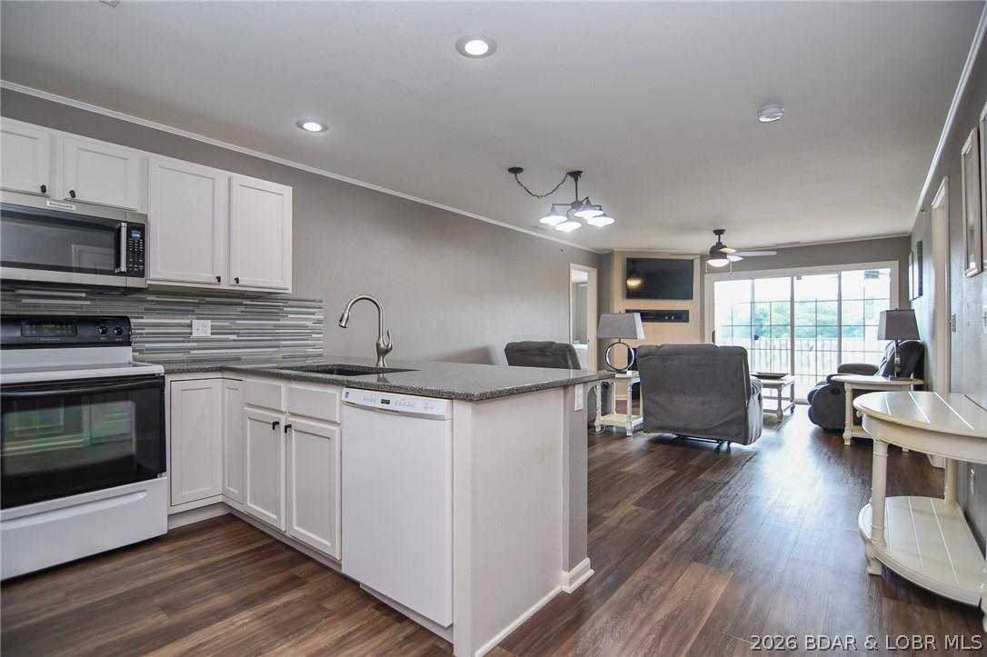 Image 2: Kitchen to dining and living area