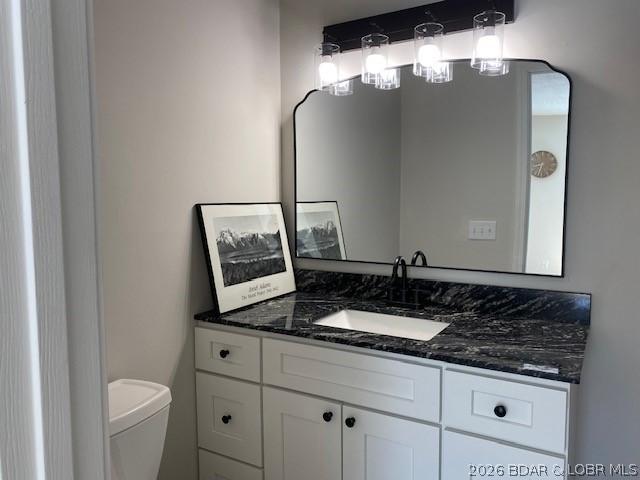 Image 4: The bathrooms have new cabinetry and hard surfaces