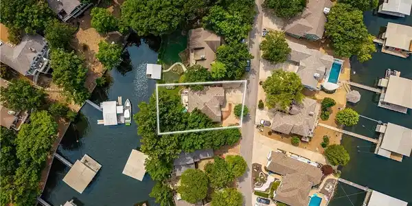 Image 3: Aerial of neighborhood with home highlighted