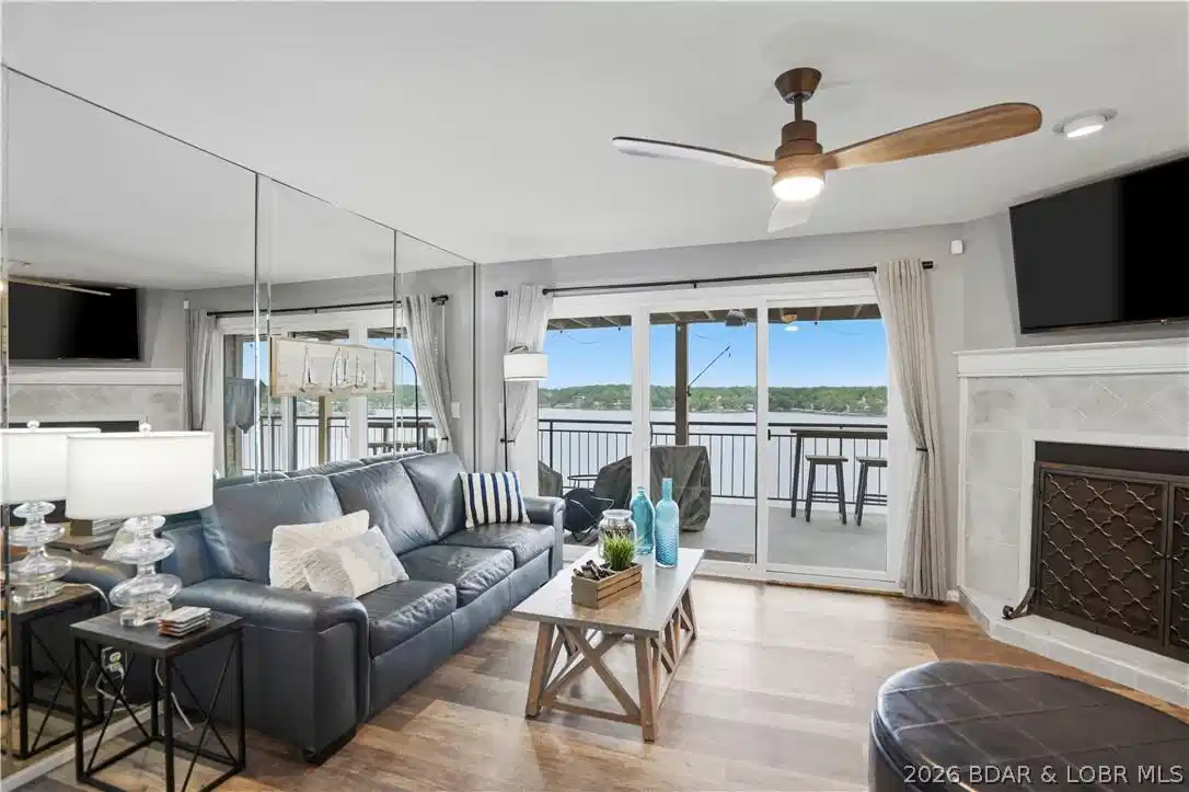 Image 1: Living Room with Lake View