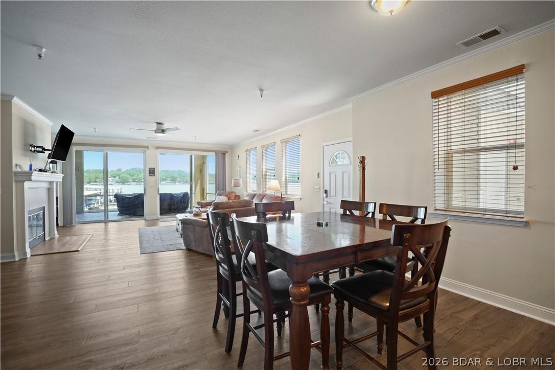 Image 2: Dining Area and Living Room