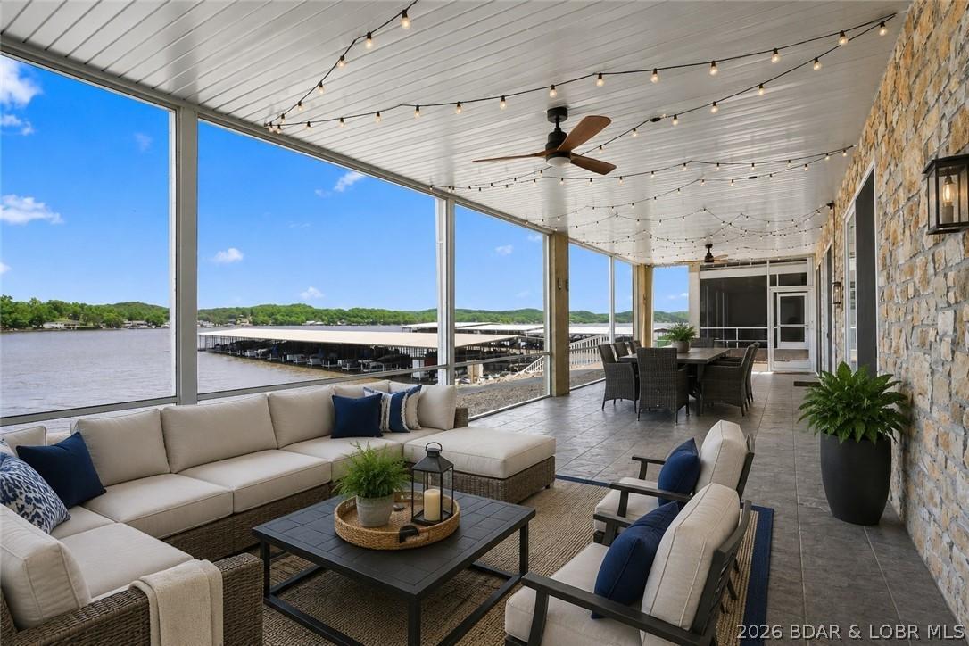 Image 3: Virtually staged Screened in Deck