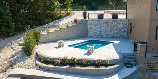 Image 3: Lakeside pool with gas fire bowls