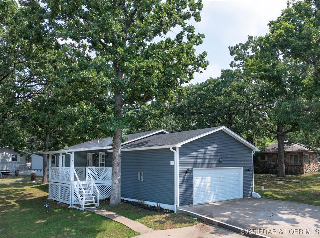 Image 2: Inviting Covered Front Porch 2 Car Garage
