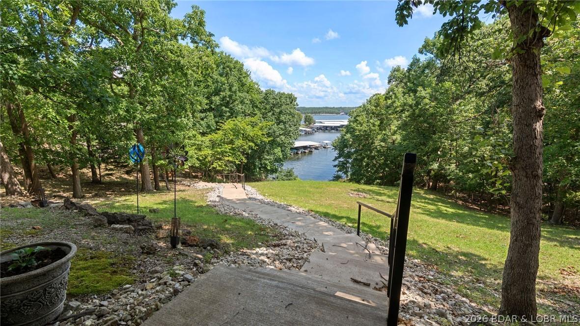 Image 4: Lower Level walk out to community dock.