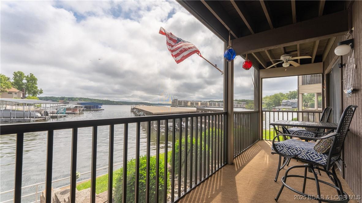 Image 1: Relax in your screened patio right at the water's