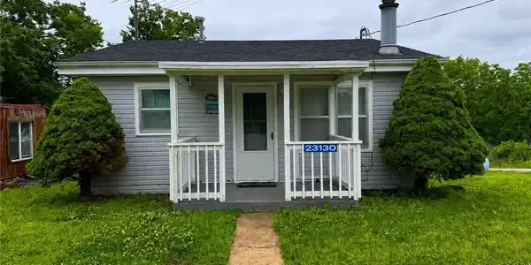 Image 3: Inviting Covered Porch