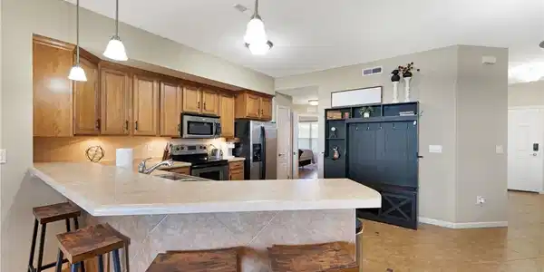 Image 4: Large kitchen with plentiful storage and pantry cl