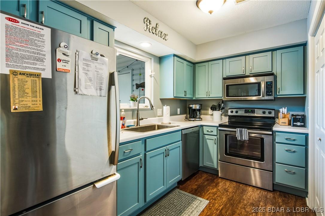 Image 2: The kitchen has a very functional layout.  Also, b