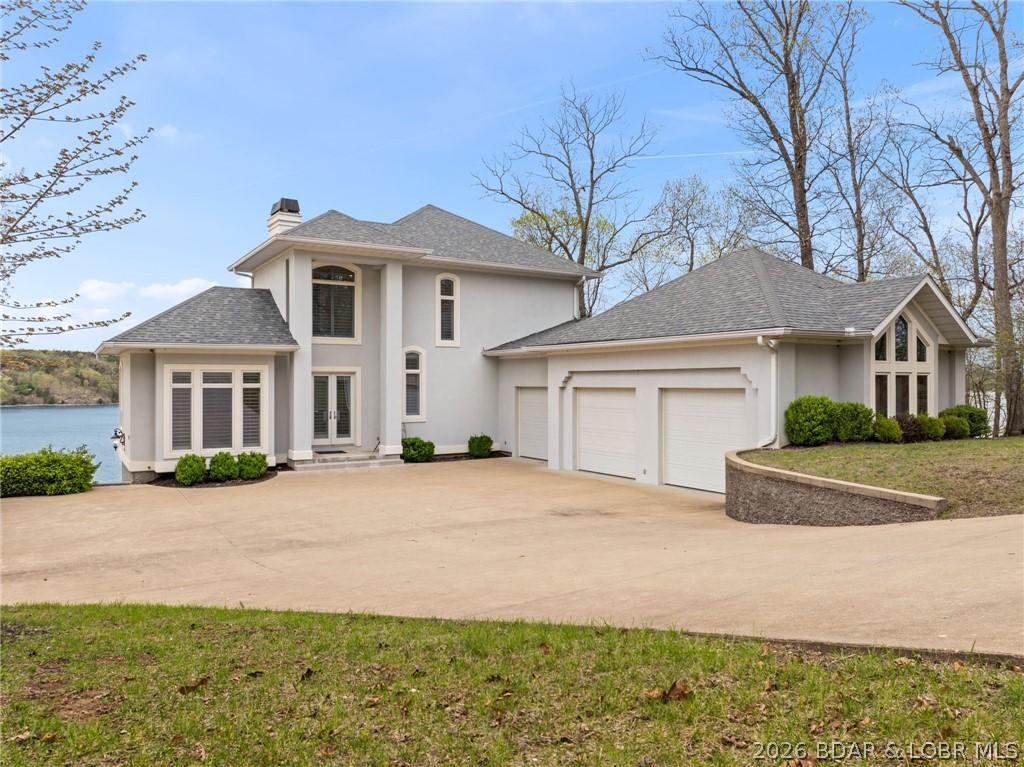 Image 2: Gorgeous Curb Appeal + Gentle Driveway
