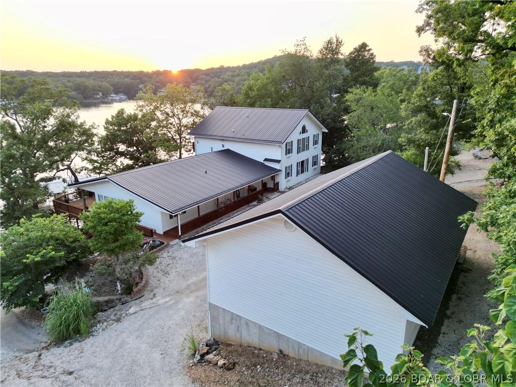 Image 2: Front of the Home and 2 Story Garage