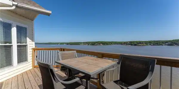 Image 3: Private lakeside deck offering breathtaking panora