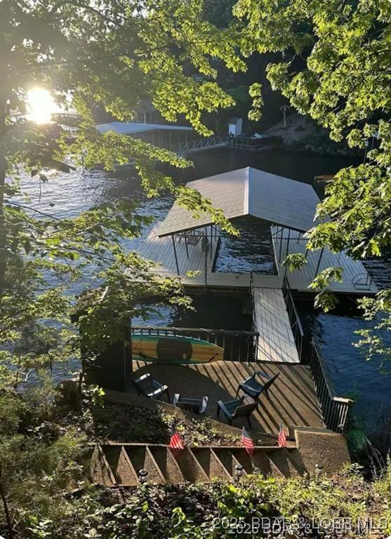 Image 1: Concrete martini deck with an amazing dock with sw