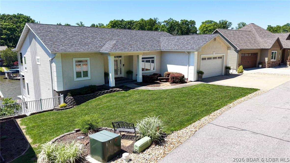 Image 4: Additional parking to the right of the home