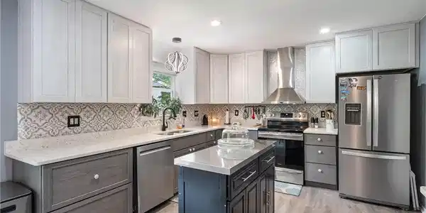 Image 2: Fully remodeled kitchen with custom cabinetry, qua