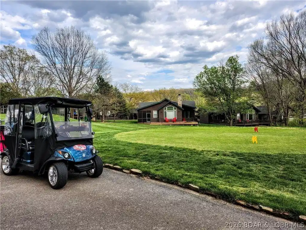 Image 1: View from the #1 Tee Box to the Cottage