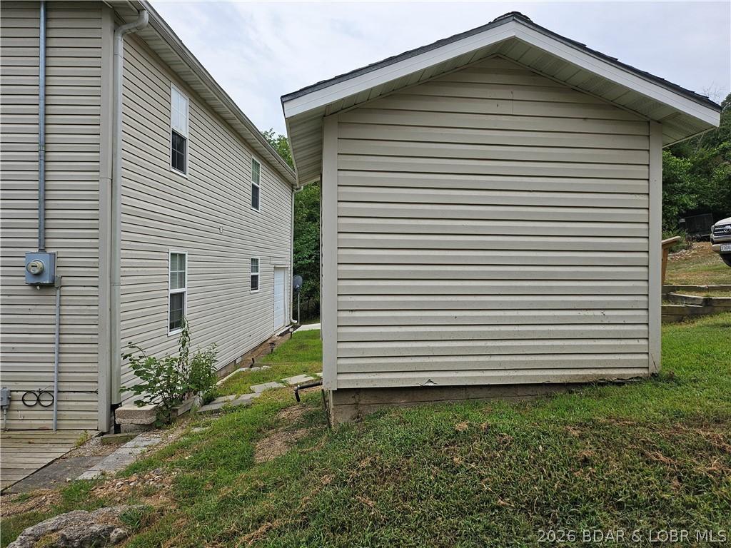 Image 3: Small building is the well house for the private w