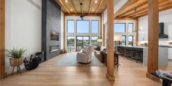 Image 4: Stunning open-concept living area with soaring cei