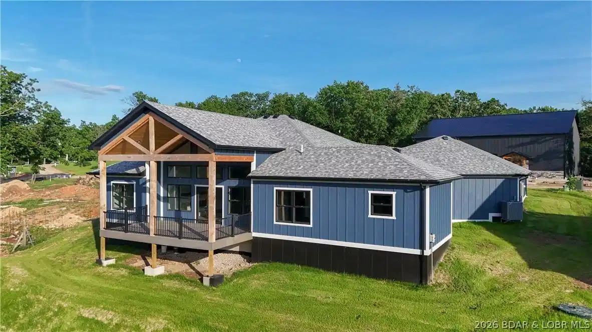 Image 1: Massive, covered deck with aluminum railing, large