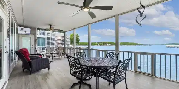 Image 4: 72" ceiling fans keep the screened in porch cool e
