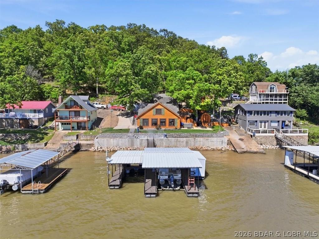 Image 1: View of home from lake