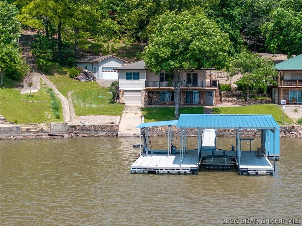 Image 4: Detached Shop, Home w/ Boathouse, Ramp, and Privat