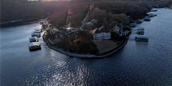 Image 2: Aerial View of the Property from the Lake