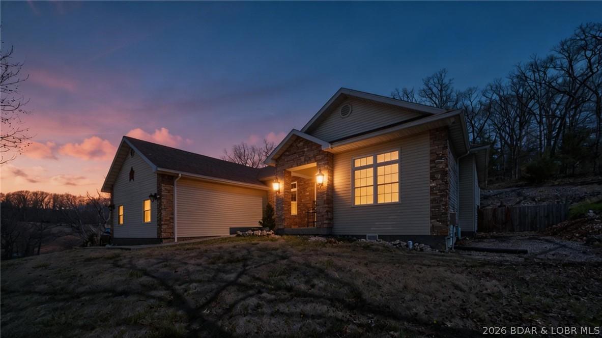 Image 3: Front of 47 Mockingbird at Dusk
