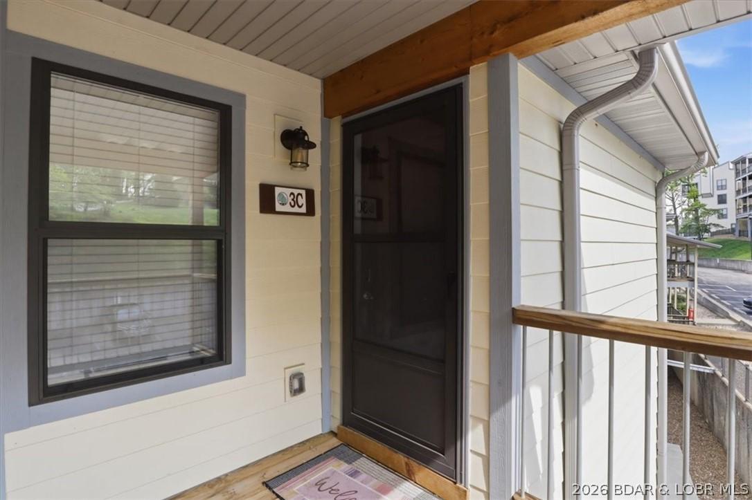 Image 2: Outside torage to the left of front door