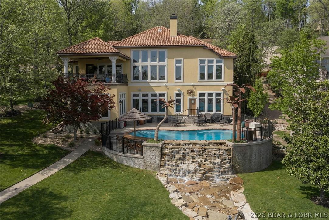Image 2: The water feature adds to the lakeside beauty.