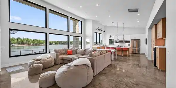 Image 2: Polished concrete floors and soaring glass walls f