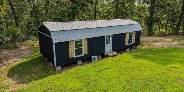Image 2: Cabin has been framed for two bedrooms, full bath,