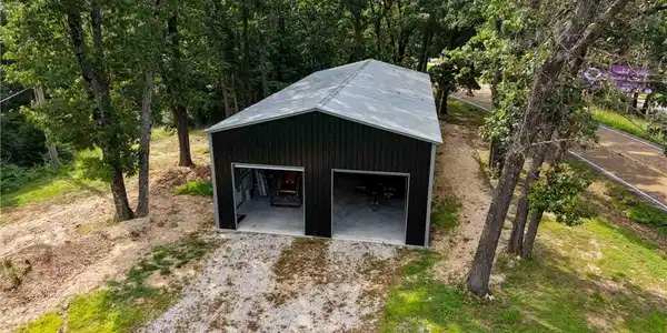 Image 3: 2100 square foot shop with two 10' overhead doors.
