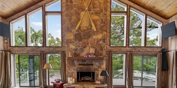 Image 4: Living Room w/ Floor to Ceiling Windows + Fireplac