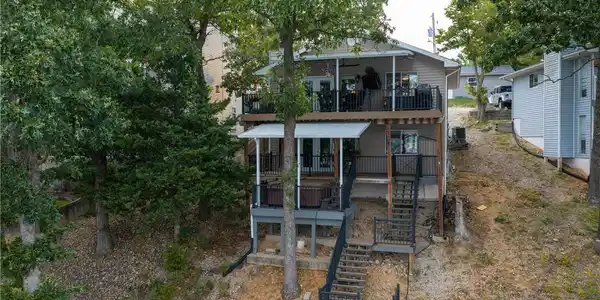 Image 2: This home has newer roof, siding and decks. (2022)