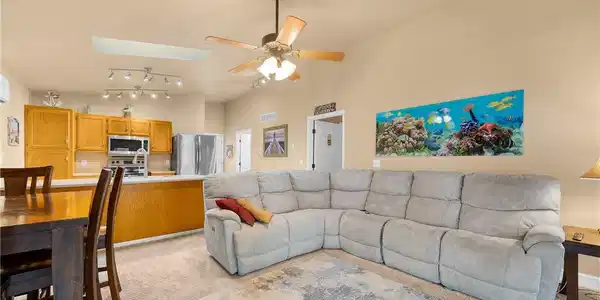 Image 4: Open concept living, dining and kitchen.