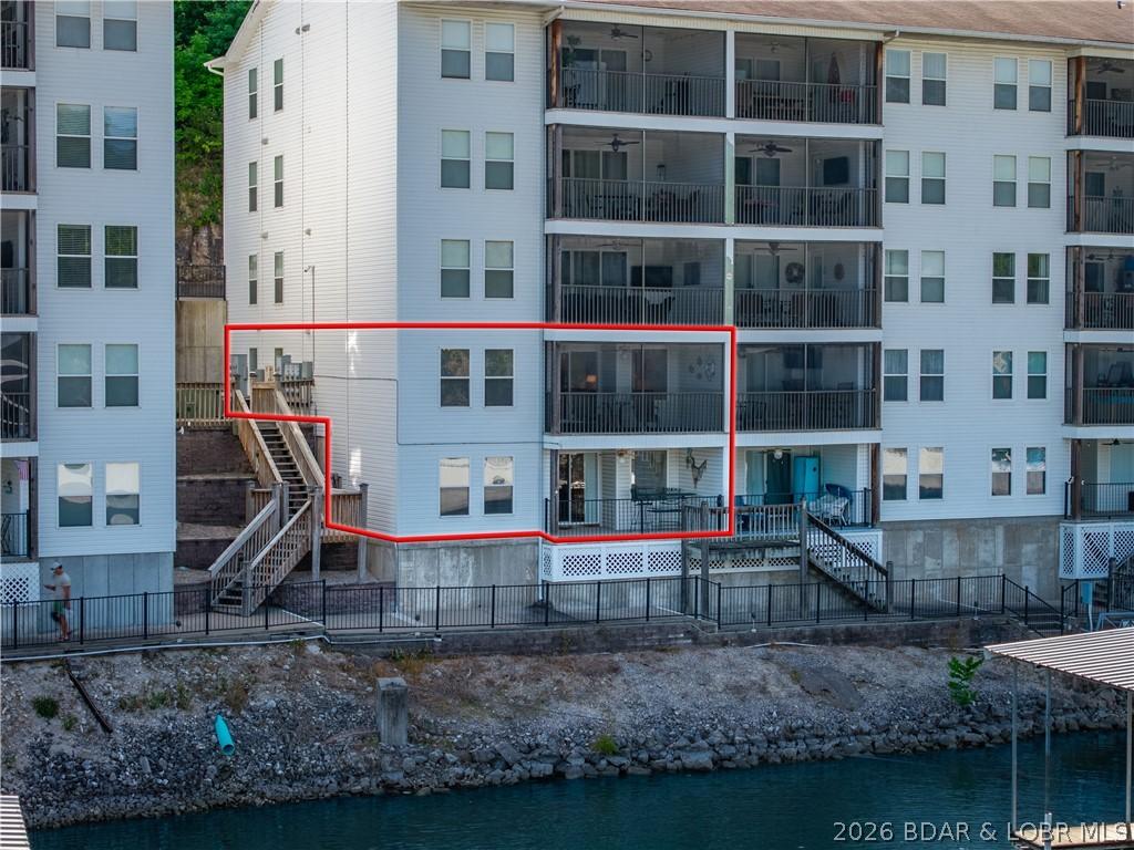 Image 2: Lower Level Walks Directly out to Dock