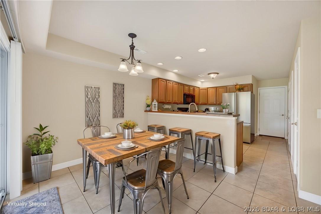 Image 4: Virtually Staged-Dining Area & Breakfast Bar and L