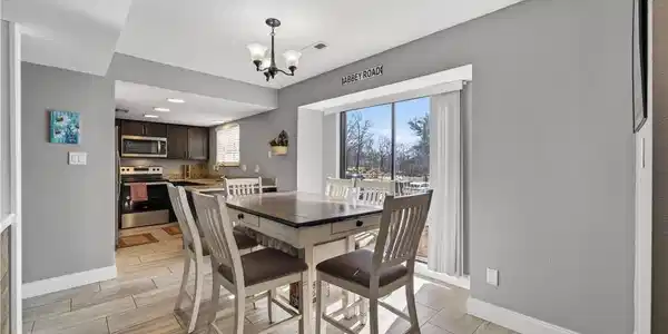 Image 2: Dining area into kitchen-from entry