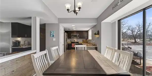 Image 4: Dining area into kitchen from entry
